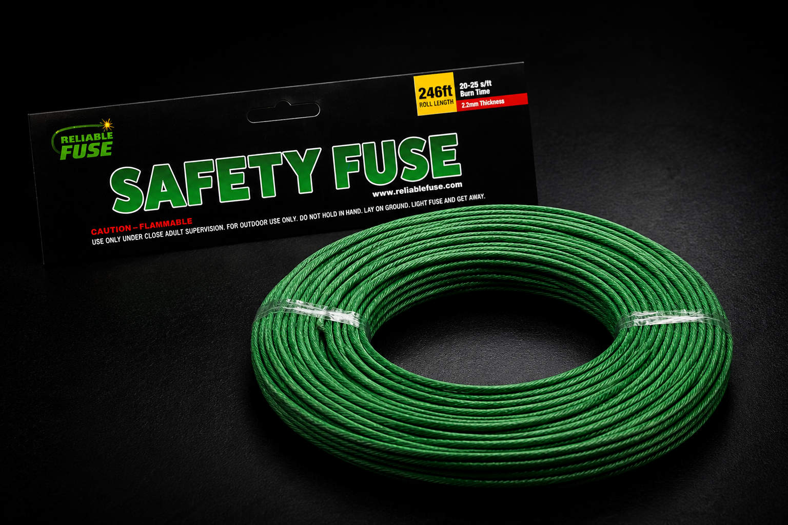 A large 246-foot coil of green 2.2mm safety fuse shown next to its Reliable Fuse retail packaging label.