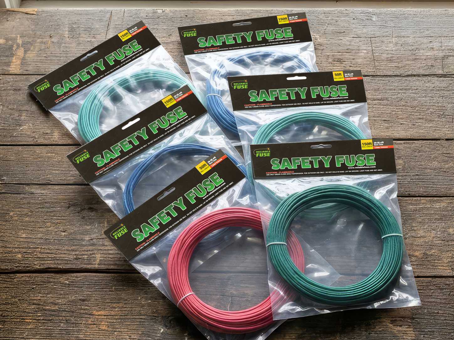 Packaged Reliable Fuse safety fuse products displaying labeled specifications, diameters, and burn rates.